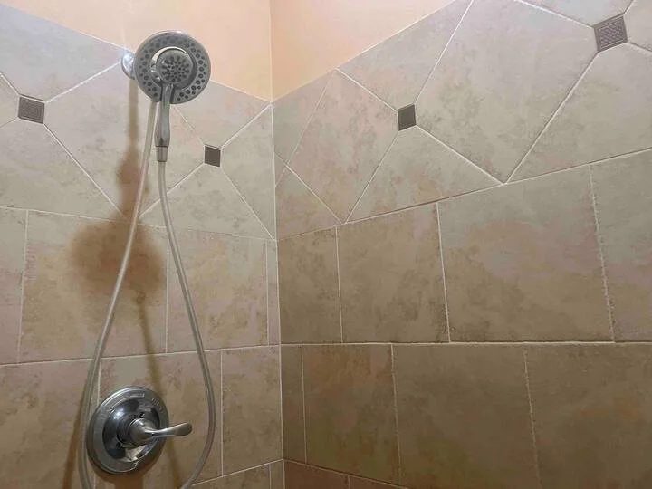 Tiled shower with a handheld showerhead